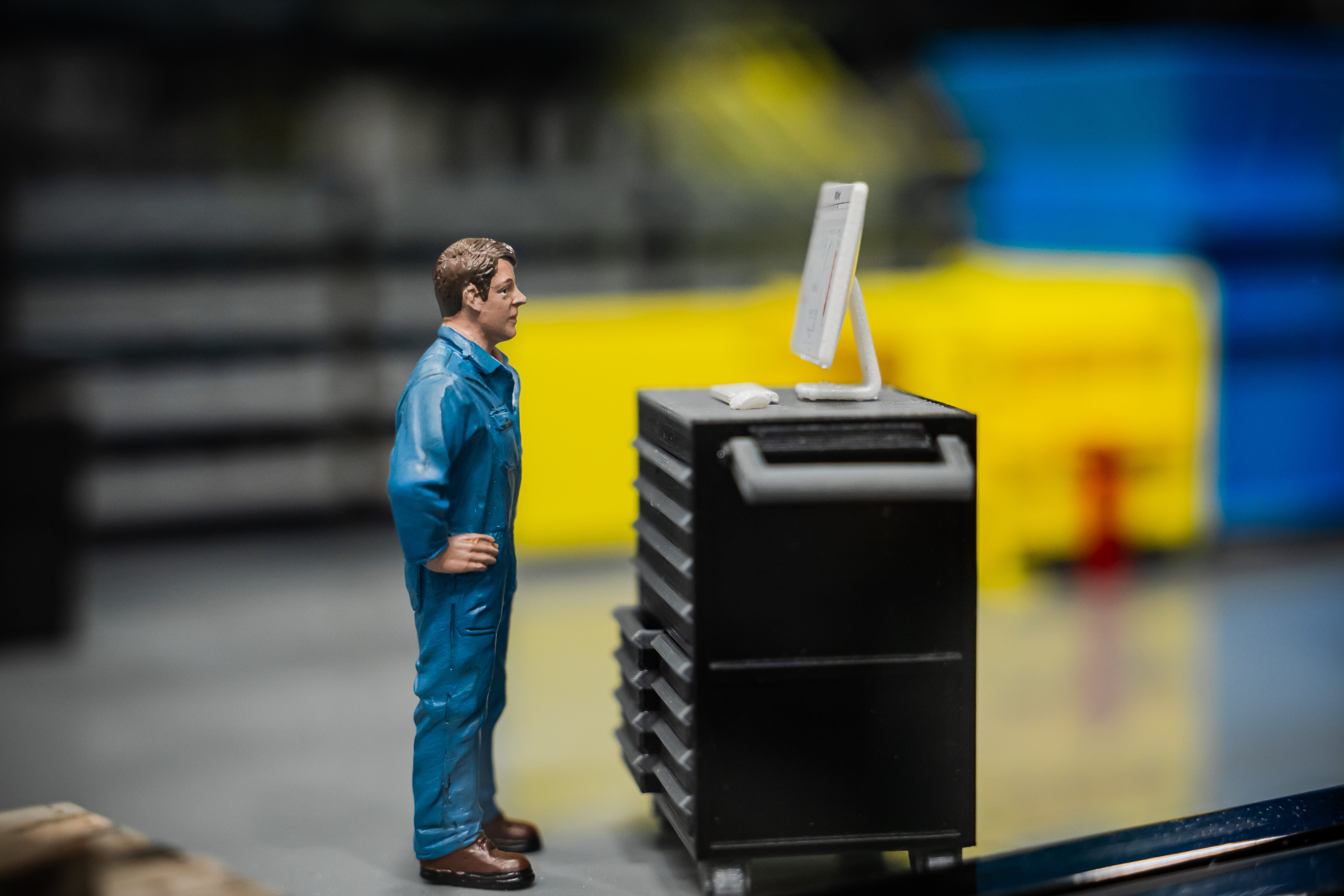 3D model guy looking at screen